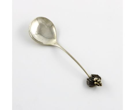 By Georg Jensen, a Danish silver spoon, design no. 89, circa 1919-1927, the handle with a berry and pierced palm finial,  len