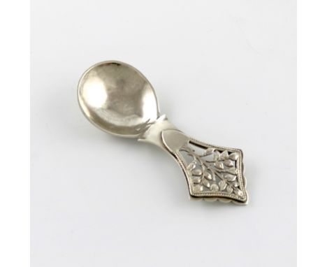 By H. G. Murphy, an Arts and Crafts silver Tree of Life caddy spoon, London 1929, also marked with the Falcon mark, spot-hamm