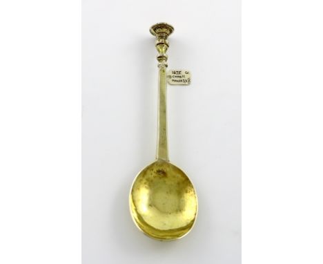 A Charles II heavy-gauge silver-gilt Seal-top spoon, by Steven Venables, London 1675, oval bowl, faceted tapering stem with a