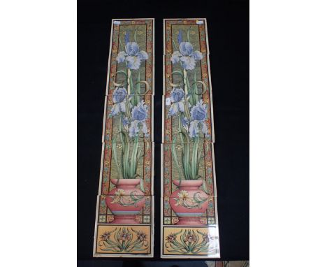 A PAIR OF REPRODUCTION TILE PANELS from fireplace cheeks, depicting pots of irises (used, some cement) (10 tiles)