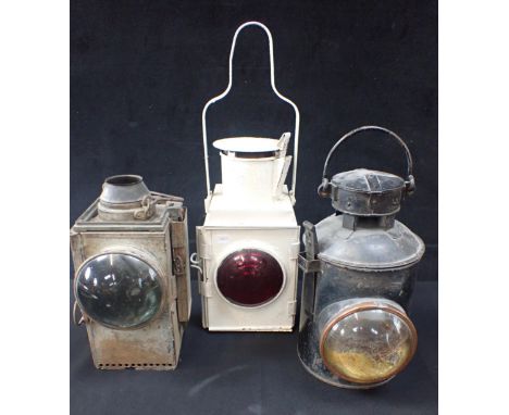 TWO RAILWAY HEAD LAMPS one made by Lamp Manufacturing &amp; Railway Supplies Ltd, with a railway tail lamp (3)