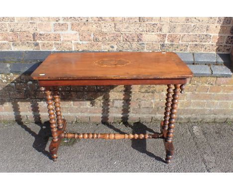 A VICTORIAN WALNUT CENTRE TABLE with marquetry top and bobbin-turned supports 89 x 44cm