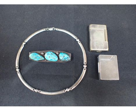 TWO ENGINE TURNED LIGHTERS with a white metal necklace and a brooch