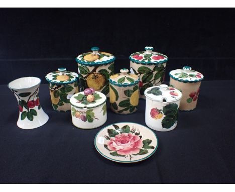 WEMYSS POTTERY: A VASE PAINTED WITH CHERRIES 11.5cm high, a Wemyss plate 14cm, and various covered jars, one 'Plichta', some 