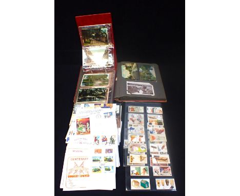 A COLLECTION OF POSTCARDS AND CIGARETTE CARDS including Dorchester and other Dorset cards First World War cards etc