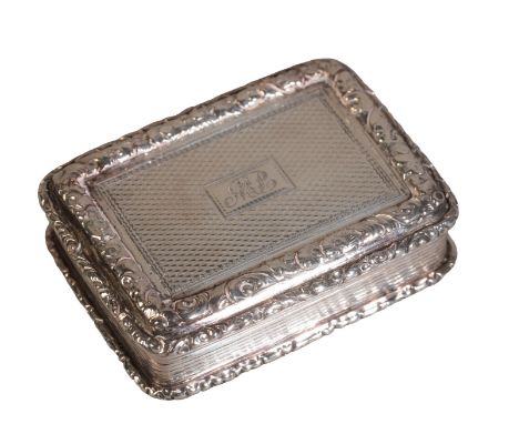 AN EARLY VICTORIAN SILVER VINAIGRETTE by Thomas Edwards, London 1851, the engine turned exterior with cast leaf scroll rim, g