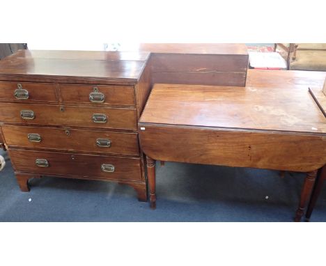 A GEORGE III MAHOGANY CHEST OF DRAWERS with pressed brass handles and escutcheons (replaced), on tall bracket feet 100cm wide