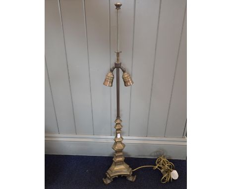 A BRASS TABLE LAMP the base in the form of an altar candlestick 92cm high