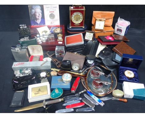 A PAIR OF MINIATURE JAGUAR MASCOTS, A CORKSCREW 'The Victory', lighters, hipflasks, wallets, a few commemorative coins and ot