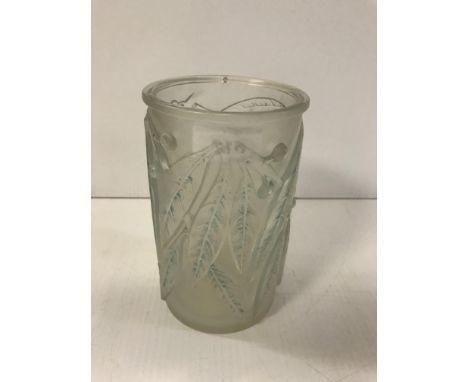 A Lalique 'Laurrier' pattern vase in pale blue, 18 cm high CONDITION REPORTS Has a chip to the outside edge to the underside 