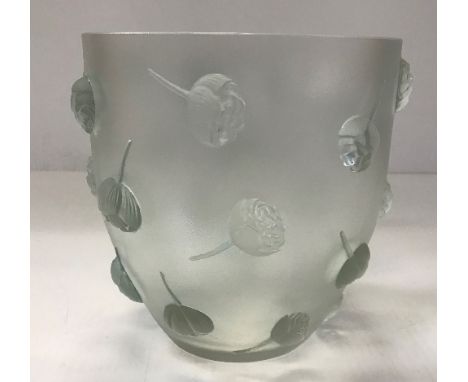 A Lalique 'Pivoines' pattern vase in pale green, 17 cm high CONDITION REPORTS Appears in good condition throughout with some 