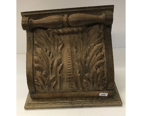 A carved oak wall shelf with acanthus leaf decoration and marble top, together with a pair of gilt and glass lustre twin wall