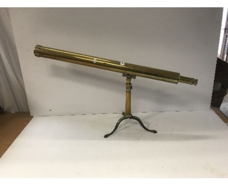 A Victorian brass telescope, 84.5 cm long max on a folding tripod stand CONDITION REPORTS Lenses are dirty.  If you look thro