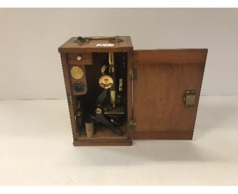 A circa 1900 mahogany cased lacquered brass and anodised monocular microscope, case 27.5 cm high