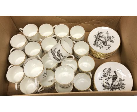 A collection of Royal Worcester coffee cups and saucers with pheasant decoration
