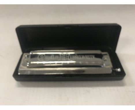 A Hering "Charlie Musselwhite", Hering's chromatic harmonica with plastic case