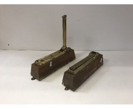 A pair of Victorian brass folding shelf wall brackets, inscribed "SP" to base, on oak mounts, 30.5 cm long overall, bracket /