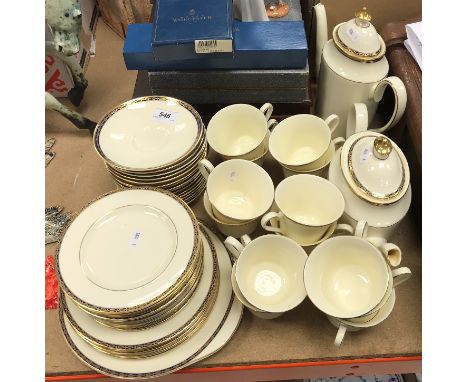 A Minton "St. James's" part tea service comprising coffee pot, teapot, thirteen teacups, fifteen saucers, thirteen tea plates
