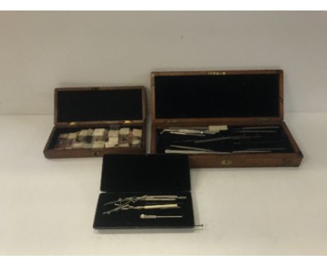 A mahogany cased surgical kit with ivorine plaque "Surgical Manufacturing Co. Surgical Instrument Makers 83-85 Mortimer Stree