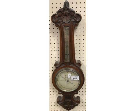 An early 20th Century 365 day mantel clock by Gustav Becker of Freiburg, housed under a glass dome, together with a Victorian
