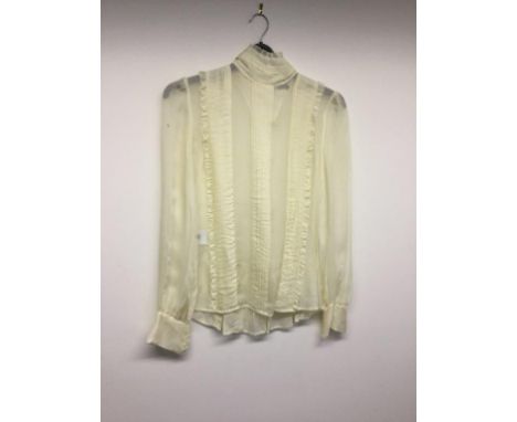 ALEXANDER McQUEEN - a ladies cream blouse, size 14