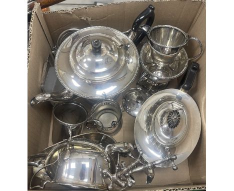 A collection of various silver plated tea wares and dinner wares including a three piece tea set, further tea pot, sugar basi