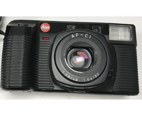 A Leica AF-C1 camera and soft case
