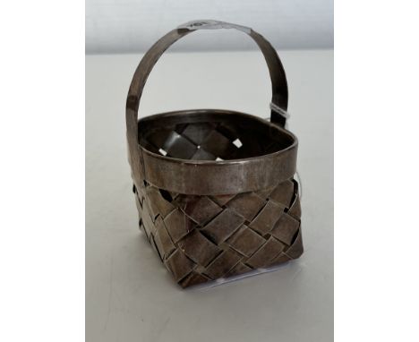 A Cartier sterling silver lattice work basket inscribed "Cartier handmade sterling" to the side 7.5 cm high, 1.65 oz