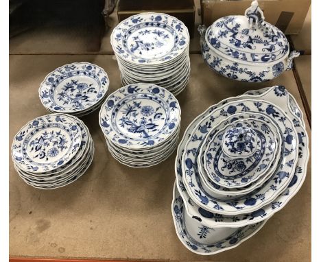 A Meissen "Onion" pattern part dinner service, comprising large oval tureen and cover with figural cornucopia finial, 28 cm h