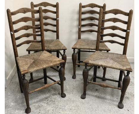 A set of four ash rush seat ladder back dining chairs, 48 cm wide x 98 cm high together with two rush seat bar back dining ch