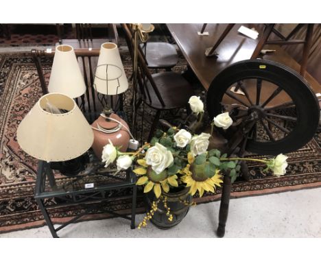 A pair of metal framed glass top occasional tables, a wrought iron tripod plant stand, a wrought iron four light candle holde