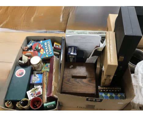 A box containing assorted vintage playing cards and games, to include Tiddlywinks, etc., a pair of Swiss horn carved beakers 