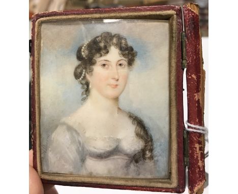 A DUNN (possibly ANDREW DUNN - IRISH Fl 1800-1820) "Young woman with hair in ringlets and pearls in a white dress", a miniatu