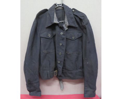 WW2 ARP Battledress Jacket Dated 1943 dark blue, woollen, single breasted, closed collar short jacket. &nbsp;Lower extended b