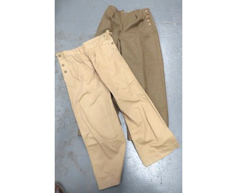 WW2 ATS Slacks And Mosquito Slacks consisting khaki woollen, wide leg slacks.  Elasticated waist and side button fastening.  