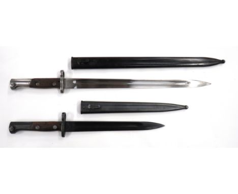 Two European Mauser Contract Bayonets consisting Yugoslavian M1924 Mauser bayonet. &nbsp;9 3/4 inch, single edged blade with 