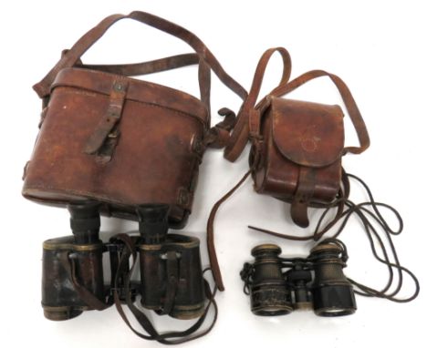 Pair Of WW1 Binoculars Dated 1916 leather covered brass body. &nbsp;Top marked "Binocular Prismatic No 2 MKII" by "Sherwood &