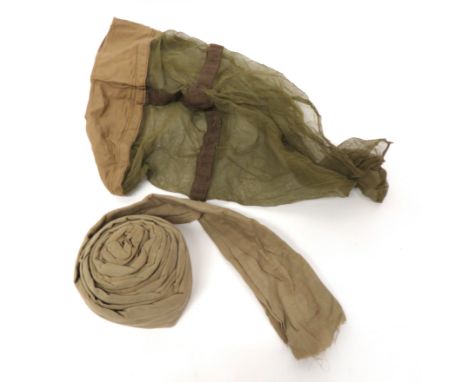 WW2 Helmet Mosquito Net And Pagri Band 1944 dated, khaki cotton helmet rim band with lower secured mosquito net. &nbsp;Togeth