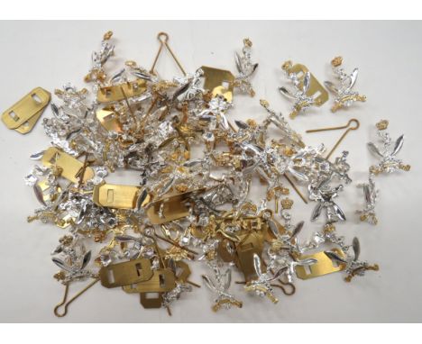 63 x Post 1953 Gurkha Signals Cap Badges plated and gilt, QC crossed kukri and Mercury. &nbsp;Rear lug fixing. &nbsp;63 items