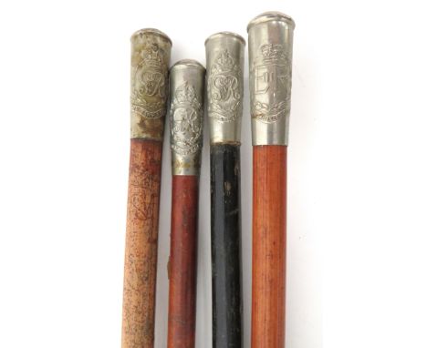 Four Various Military Police Swagger Sticks consisting white metal, thimble embossed, KC GRV Military Police example on black