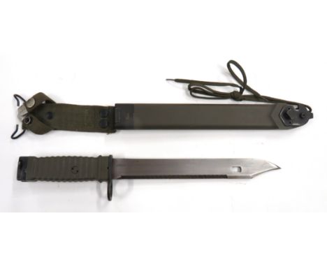 German 77 M1 Bayonet 9 3/4 inch, single edged, clipped point blade. &nbsp;Lower wire cutter key. &nbsp;Rear saw back edge. &n