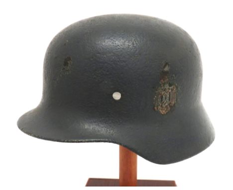 WW2 German Third Reich M1935 Steel Helmet grey, repainted shell still showing the Army decal and partly repainted national sh