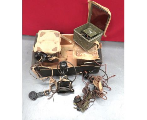 Selection Of Field Telephones And Headsets including 2 x daylight signalling lamps in hinged transit boxes ... Tin box contai