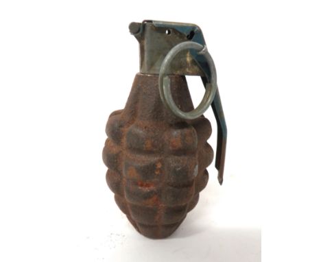 American Inert Pineapple Grenade steel fragmentation body. &nbsp;Top alloy mount with pressed tin lever. &nbsp;Safety pin and