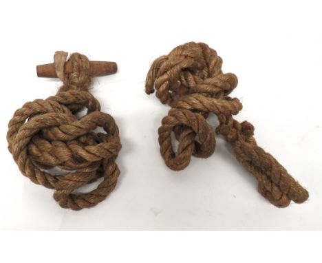 Two WW2 Airborne/Commando Toggle Ropes thick cord ropes with lower wooden toggle. &nbsp;One with original maker's linen label