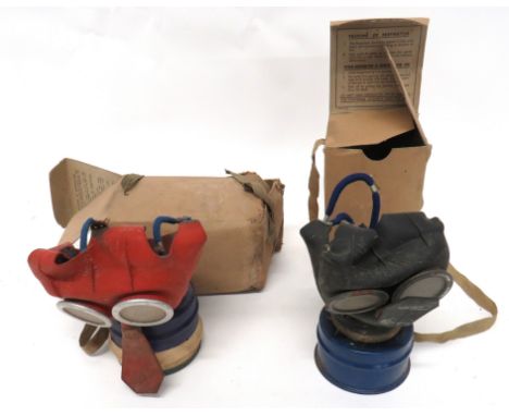 Two WW2 Children's Mickey Mouse Respirators consisting black rubber face mask variant with lower blue filter. &nbsp;Blue elas