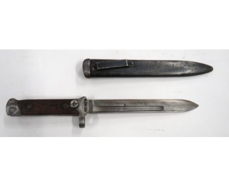 Italian M1891/38 Folding Blade Bayonet 7 inch, single edged blade with fuller. &nbsp;Steel muzzle ring, crossguard and push o