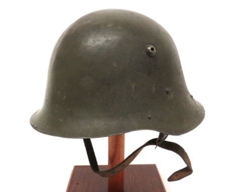 Bulgaria M1936 Steel Helmet green painted, faint ridge crown. &nbsp;Lower raw edge brim. &nbsp;Applied vent hole. &nbsp;The r