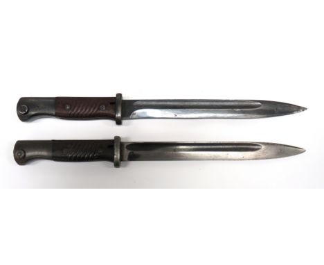 Two WW2 German K98 Bayonets 9 3/4 inch, single edged blades with fullers. &nbsp;Fortes with maker "43ASW" and "J.SCH", this w