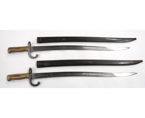 Two French M1866 Chassepot Bayonets 22 3/4 inch, single edged, yataghan blades. &nbsp;Back edges with makers, one dated "1873
